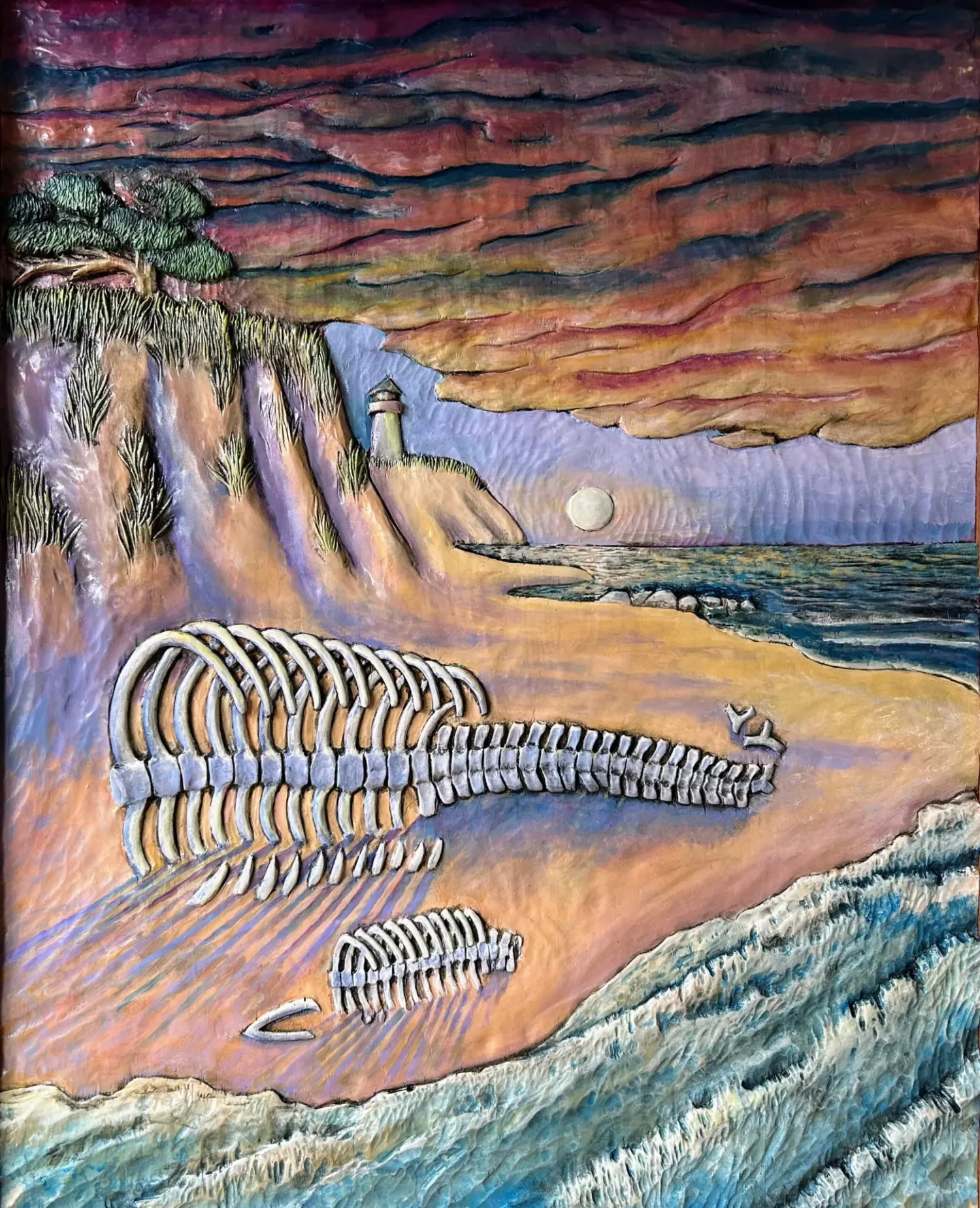 Whale and calf carcasses on the beach with threatening cloudy sky