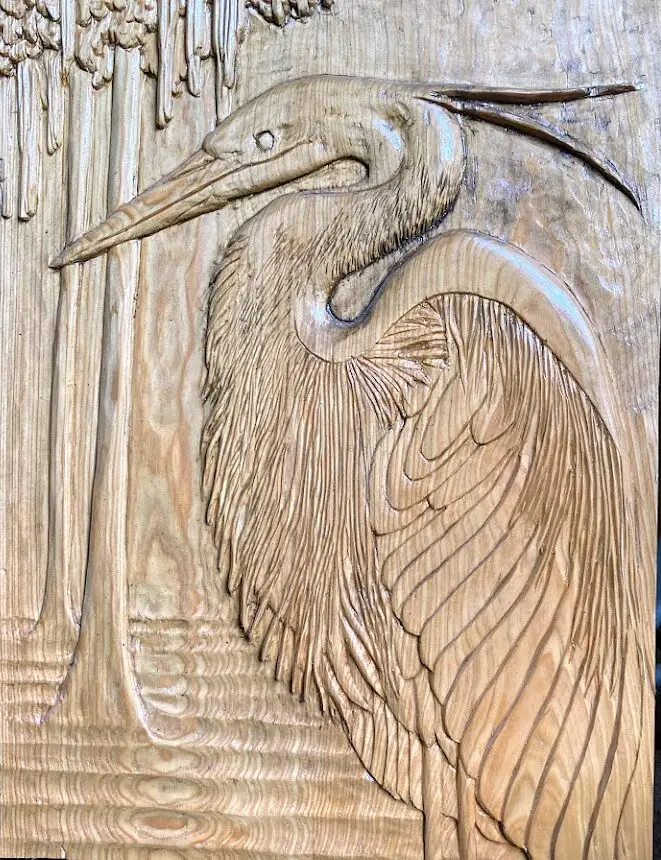Carving of Heron at a swamp was created to celebrate the rich wildlife of the Louisiana wetlands.