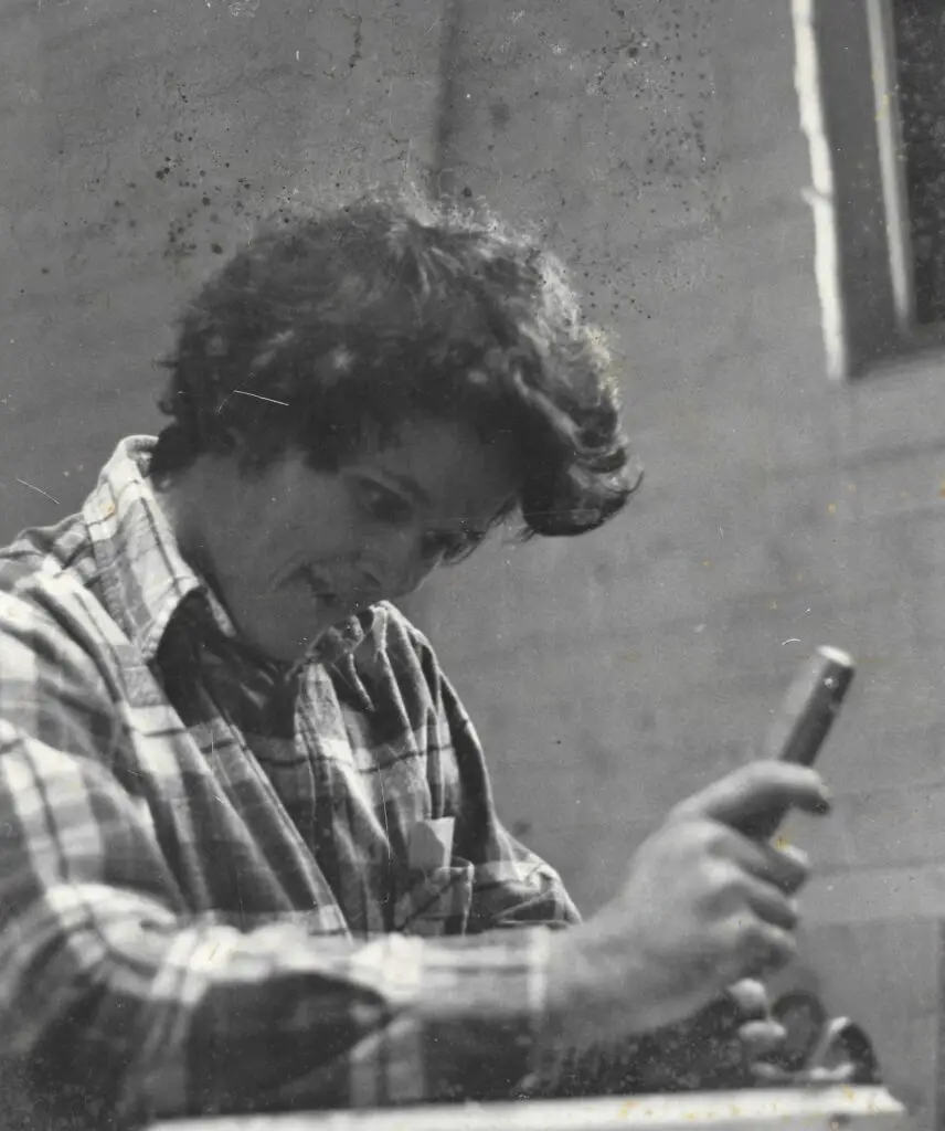 Gary Cota carving when he was in his early years