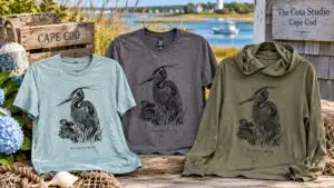 Heron T-shirt collection featuring Gary Cota’s original pen and ink wildlife drawing in three colors.