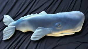 Hand-carved blue-gray whale sculpture designed for outdoor display.